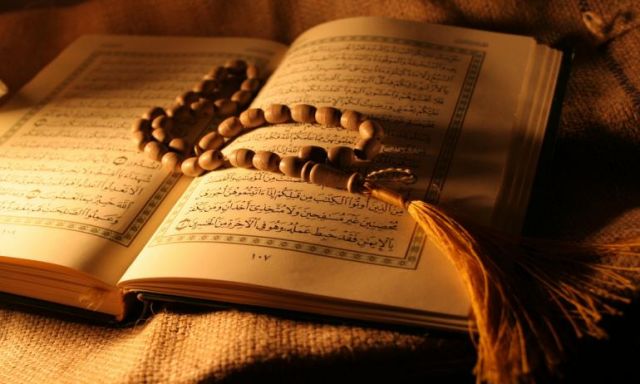 تركي يكتب أصغر نسخة من القرآن الكريم
