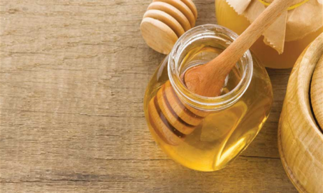 العسل والليمون لعلاج الإنفلونزا والبرد