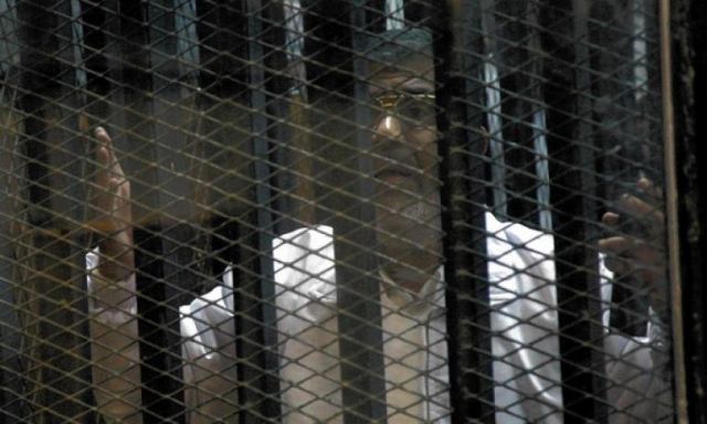 وصول ”مرسى” وقيادات الإخوان أكاديمية الشرطة استعدادًا لبدء محاكمتهم  فى قضية ”التخابر”