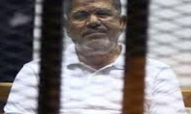 وصول مرسى لأكاديمية الشرطة لمحاكمته فى ”الهروب الكبير”