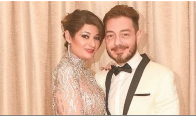 أحمد زاهر وزوجته 