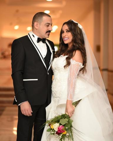 محمد دياب وزوجته هاجر الإبياري