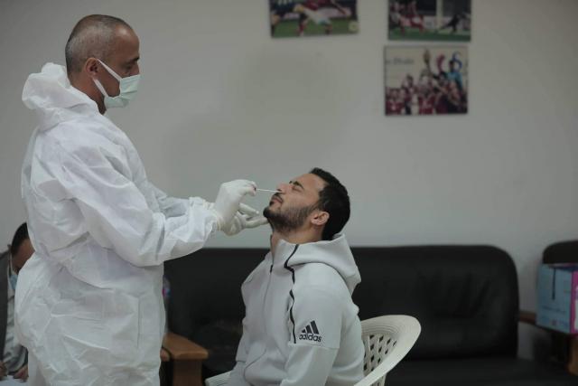 مسحة طبية لبعثة الأهلي بعد الوصول إلى قطر
