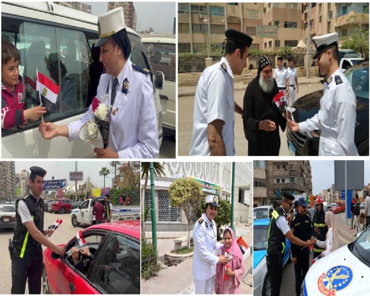 بمناسبة عيد الفطر المبارك .. رجال الشرطة يشاركون المواطنين فرحة العيد بتوزيع الهدايا عليهم