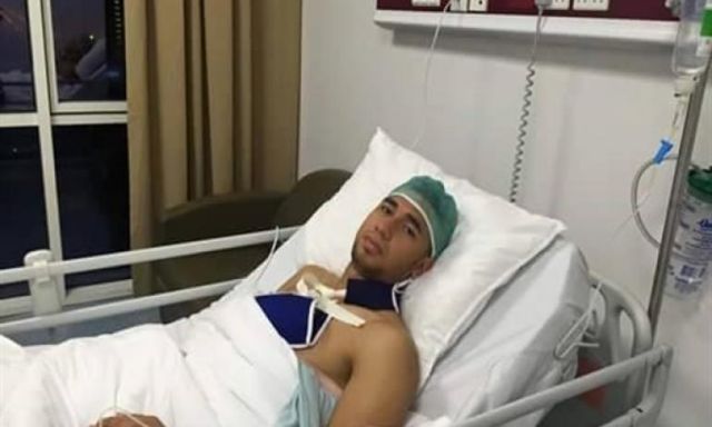 بالصورة .. تريزيجيه لاعب المنتخب الوطني فى المستشفى بعد إصابته بخلع فى الأمارات