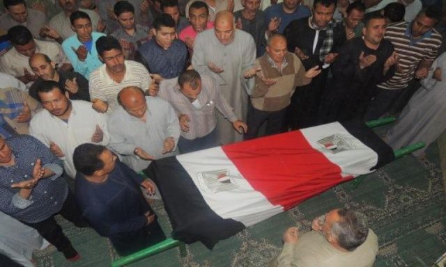بالصور ..فى جنازة مهيبة منيا القمح تودع الشهيد امين الشرطة  أمين محمد شريف