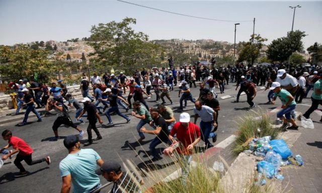 إصابة 9 فلسطينيين فى مواجهات مع قوات الاحتلال فى جمعة الأعلام