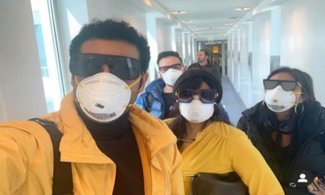شاهد.. فيفي عبده وعمرو سعد بالكمامة في المطار خوفا من فيروس كورونا